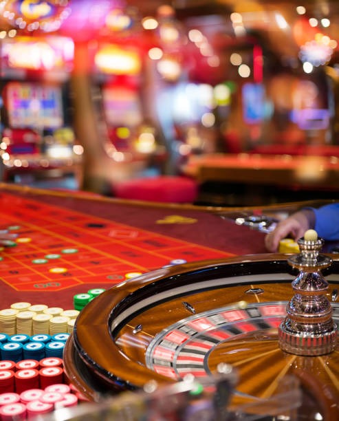 Book of Dead slot interface showing reels and spin button on mobile screen